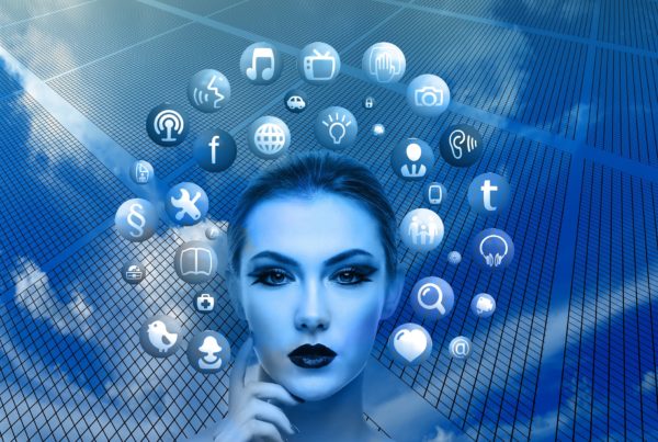 Woman with blue skin and makeup, contemplating digital icons overlaying a grid background, suggesting themes of school broadband and connectivity.