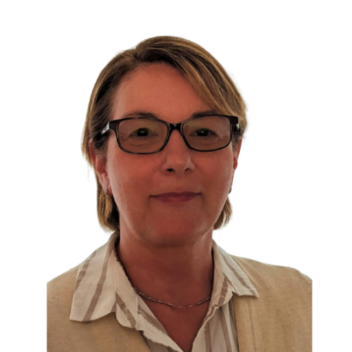 Meet the team: Middle-aged woman with short hair and glasses, wearing a beige blouse, smiling against a plain white background.