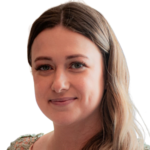 Meet the team: Close-up portrait of a smiling woman with long, light brown hair, wearing a green top, against a white background.